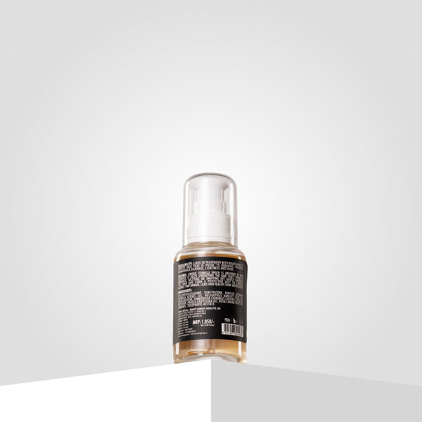 Argan Oil Hair Oil Treatment – Back view. Lightweight, nourishing oil enhances shine, reduces frizz, and hydrates hair.