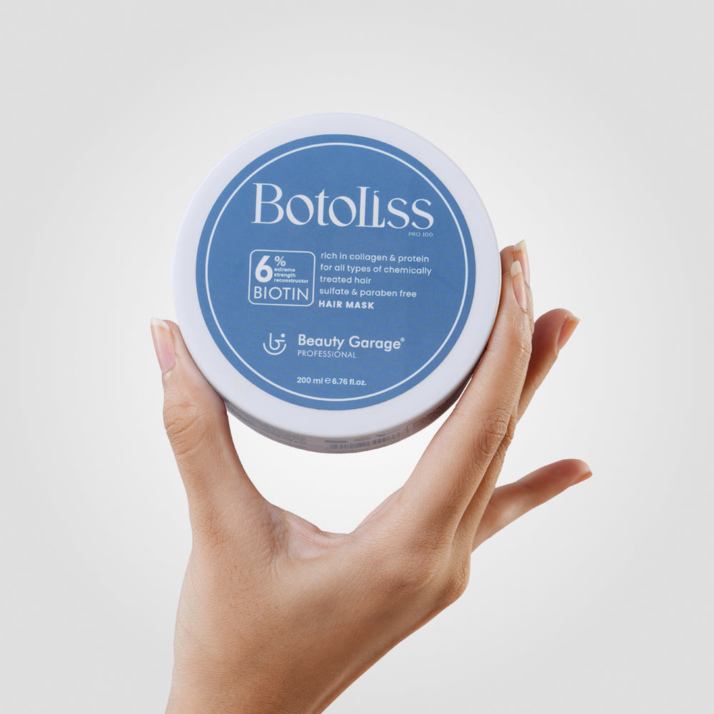 The Botoliss Biotin Hair Mask comes in a stylish container with a blue label, featuring 6% biotin and collagen