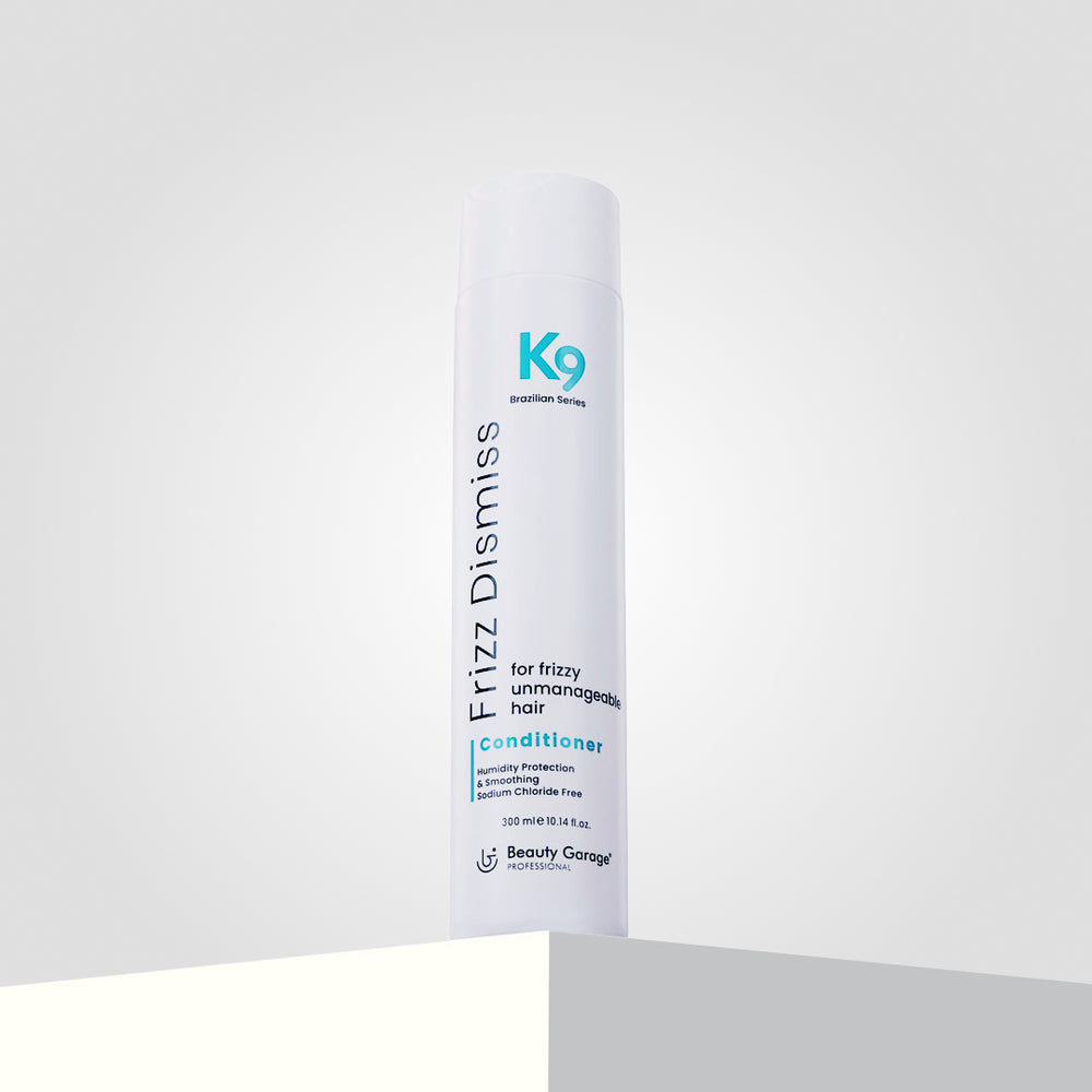 K9 Frizz Dismiss Conditioner with Botoplexx technology for frizzy, unmanageable hair, 200 ml, on a light gray background.