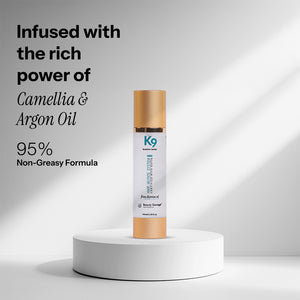 A bottle of Botoplexx K9 Frizz Dismiss Oil repair serum infused with the rich power of Camellia, 95% non-greasy formula.