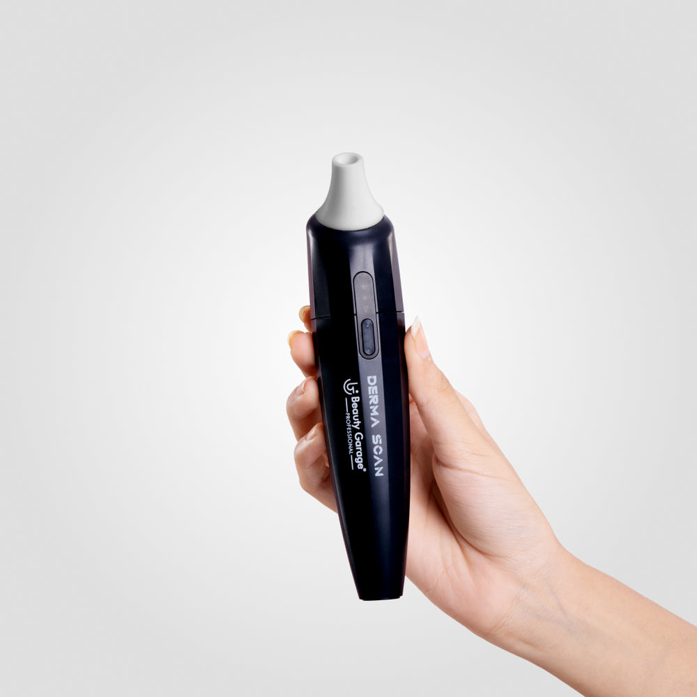 Derma scanner in its precision with a black handheld digital thermometer.