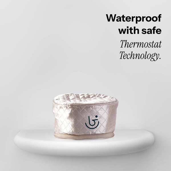 A quilted white heated cap seamlessly integrates into your heating cap lifestyle,"Waterproof with safe Thermostat Technology.