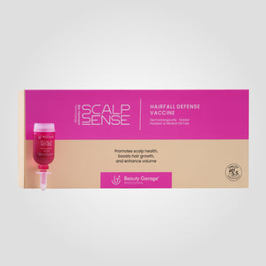 Scalp Sense Hairfall Defense Vaccine packaging features soothing pink and beige colors.