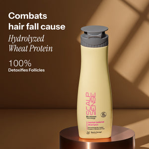 A bottle of ScalpSense Hairfall Defense Shampoo with its potent hydrolyzed wheat protein formula for combating hair fall.