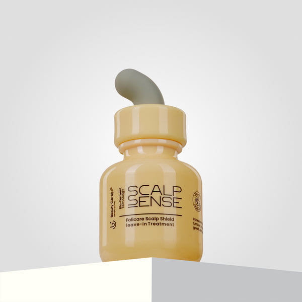 ScalpSense Folicare Scalp Shield Leave-In Treatment with a dispenser rests elegantly on a light gray surface.