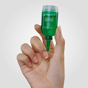 A hand holds a small green bottle labeled "ScalpSense Oil Out Vaccine," an innovative solution for healthier hair.