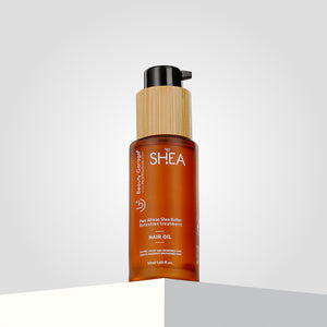 A brown bottle of Shea Retention hair oil for your hair care routine.