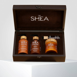 Shea retention gift pack of 4 with shampoo, conditioner, oil, and butter for deep nourishment and hair hydration.