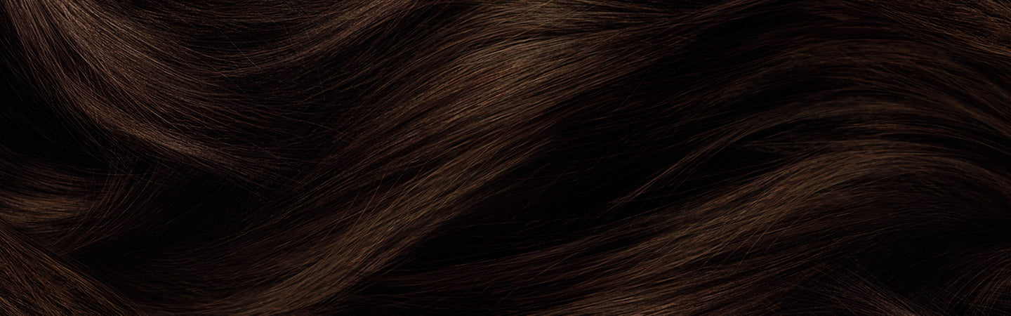 Slider image includes Close-up of wavy, dark brown hair with a glossy texture.